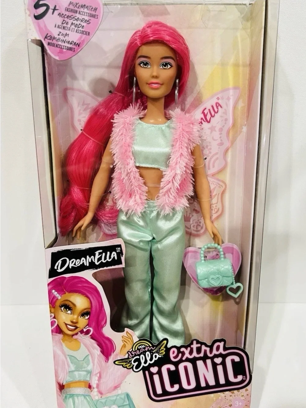 Extra Iconic Dream Ella doll in Mint Satin Jumpsuit with Pink Feather Vest